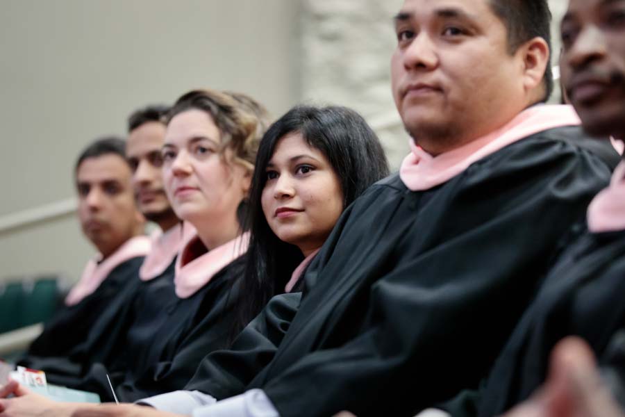 Public health students listen to a speaker