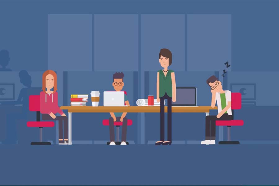 Clipart of three students seated at a table with a professor standing nearby in a library setting.