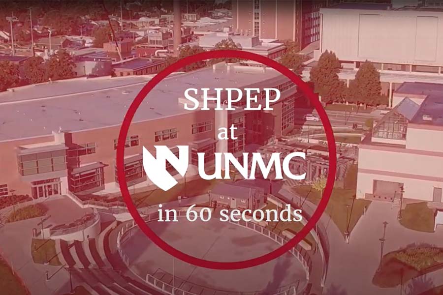 Text "SHPEP at UNMC in 60 seconds" in front of a wide shot of the UNMC campus