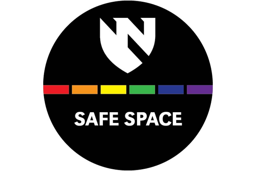 A circular sticker with the UNMC shield and the phrase "Safe Space"