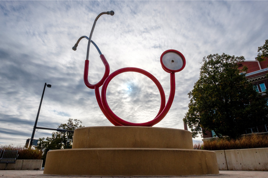 The "Hope" statue on the UNMC Omaha campus, a tall red stethoscope