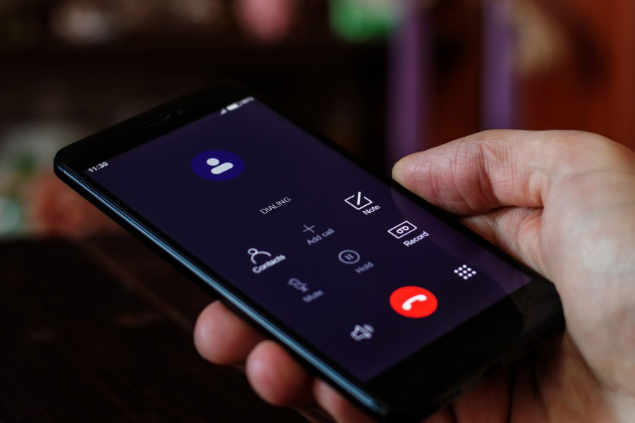 cell phone showing an outgoing call in progress