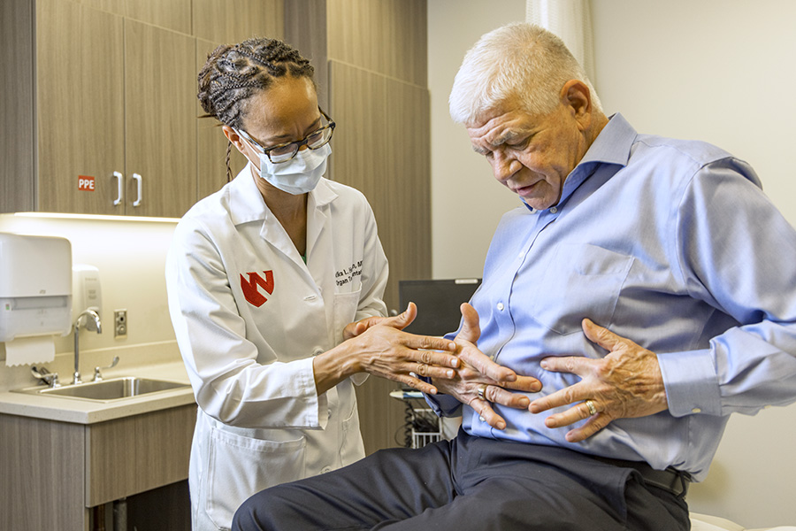 Dr. Arika Hoffman examines a patient