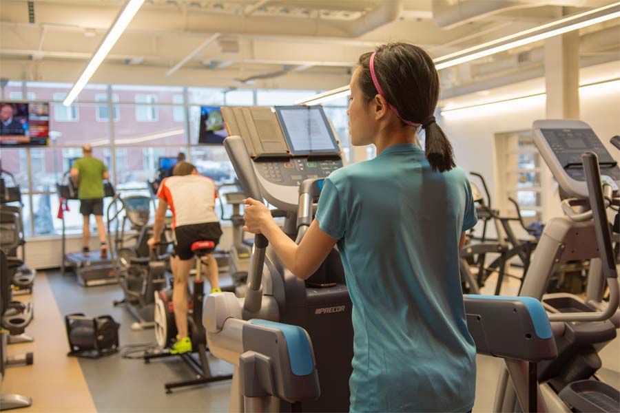 A woman uses a treadmill at the Center for Healthy Living