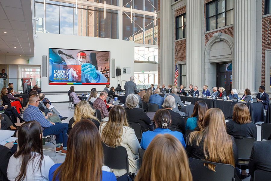 Guests attend an event in the Wigton Atrium.